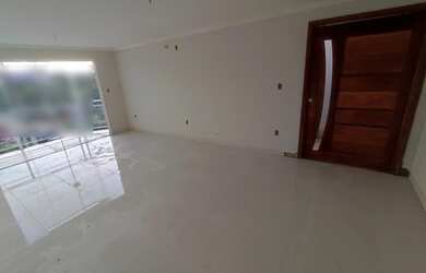 Imagem: A casa possui 3 Dormitórios, 3 Banheiros, 2 Vagas na garagem