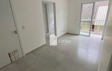 Imagem: O apartamento possui 2 Dormitórios, 1 Banheiro, 1 Vaga na garagem