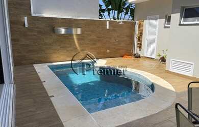 Imagem: A casa em condomínio possui 4 Dormitórios, 5 Banheiros, 4