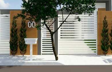 Imagem: A casa possui 3 Dormitórios, 2 Banheiros, 2 Vagas na garagem