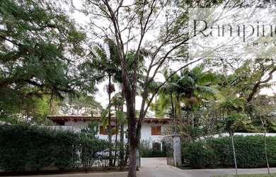 Imagem: A casa para alugar possui 4 Dormitórios, 5 Banheiros, 5 Vagas