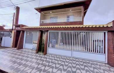 Imagem: A casa possui 2 Dormitórios, 1 Banheiro, 1 Vaga na garagem