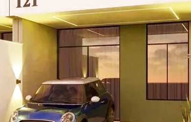 Imagem: A casa possui 3 Dormitórios, 2 Banheiros, 2 Vagas na garagem