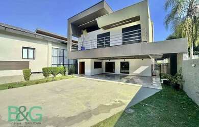 Imagem: A casa em condomínio possui 4 Dormitórios, 4 Banheiros, 5