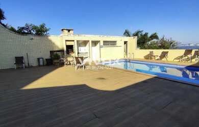 Imagem: A casa possui 5 Dormitórios, 5 Banheiros, 5 Vagas na garagem