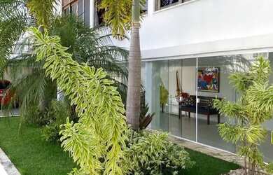 Imagem: A casa possui 4 Dormitórios, 5 Banheiros, 5 Vagas na garagem