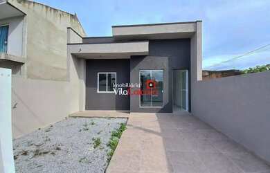 Imagem: A casa possui 3 Dormitórios, 2 Banheiros, 3 Vagas na garagem