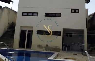 Imagem: A casa possui 5 Dormitórios, 4 Banheiros, 5 Vagas na garagem