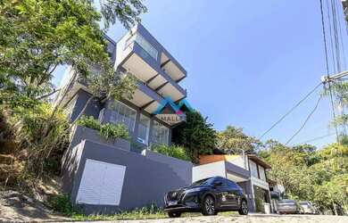 Imagem 3: Excelente Casa Triplex com 4 suítes, 436 m², toda reformada, à venda no Condomínio Ubá Ind