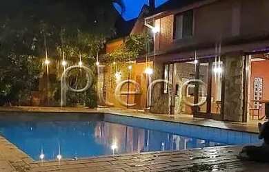 Imagem: A casa possui 5 Dormitórios, 4 Banheiros, 4 Vagas na garagem