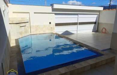 Imagem: A casa possui 3 Dormitórios, 4 Banheiros, 3 Vagas na garagem