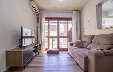 Imagem: O apartamento possui 2 Dormitórios, 1 Banheiro, 1 Vaga na garagem