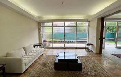 Imagem 6: Casa a venda arquitetura modernista 4 suítes e 6 vagas