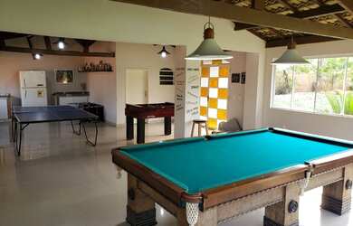 Imagem: A casa em condomínio possui 5 Dormitórios, 5 Banheiros, 5