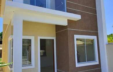 Imagem: A casa possui 3 Dormitórios, 3 Banheiros, 2 Vagas na garagem