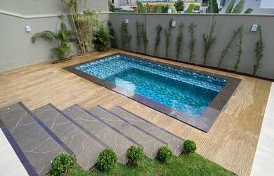 Imagem: A casa em condomínio possui 4 Dormitórios, 5 Banheiros, 4