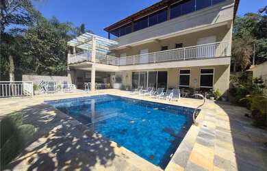 Imagem: A casa em condomínio possui 3 Dormitórios, 5 Banheiros, 2