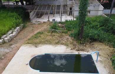 Imagem: A casa possui 3 Dormitórios, 2 Banheiros, 2 Vagas na garagem