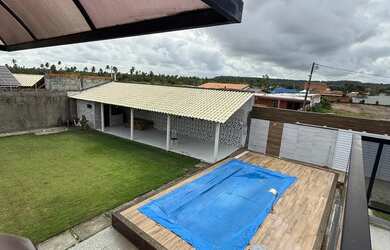 Imagem: A casa possui 3 Dormitórios, 3 Banheiros, 3 Vagas na garagem