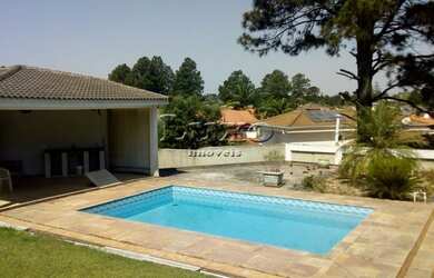 Imagem: A casa em condomínio possui 4 Dormitórios, 2 Banheiros, 2