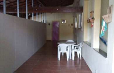 Imagem: A casa possui 3 Dormitórios, 4 Banheiros, 3 Vagas na garagem