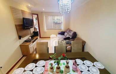 Imagem: A casa e possui 3 Dormitórios, Suítes, 2 Banheiros, 4 Vagas