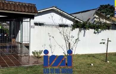 Imagem: A casa possui 2 Dormitórios, 1 Banheiro, 2 Vagas na garagem