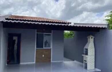 Imagem: A casa possui 2 Dormitórios, 1 Banheiro, 2 Vagas na garagem