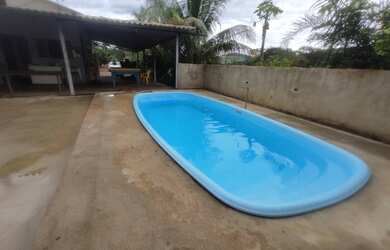 Imagem: A pousada chalé possui 3 Dormitórios, 4 Vagas na garagem e