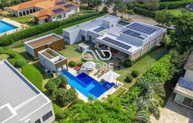 Imagem: A casa em condomínio possui 5 Dormitórios, 5 Banheiros, 3