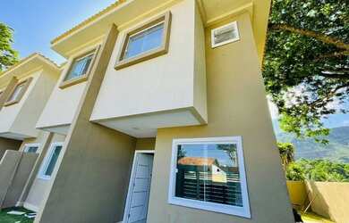 Imagem: A casa possui 2 Dormitórios, 3 Banheiros, 1 Vaga na garagem