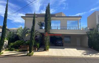 Imagem: A casa em condomínio possui 4 Dormitórios, 5 Banheiros, 4