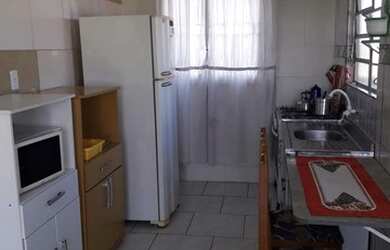 Imagem: A casa possui 2 Dormitórios e 1 Vaga na garagem e está localizado