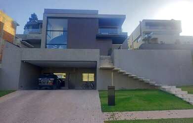 Imagem: A casa em condomínio possui 4 Dormitórios, 5 Banheiros, 5