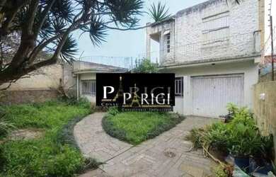 Imagem: A casa possui 3 Dormitórios, 3 Banheiros, 3 Vagas na garagem