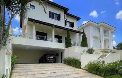 Imagem: A casa em condomínio possui 4 Dormitórios, 4 Banheiros, 5