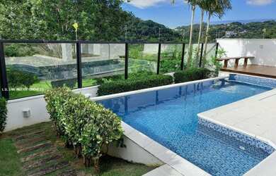 Imagem: A casa possui 3 Dormitórios, 4 Banheiros, 4 Vagas na garagem