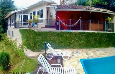 Imagem: A casa possui 3 Dormitórios, 1 Banheiro, 4 Vagas na garagem