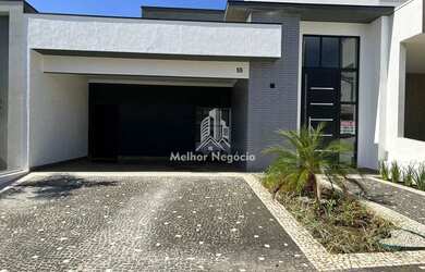 Imagem: A casa possui 3 Dormitórios, 2 Banheiros, 4 Vagas na garagem