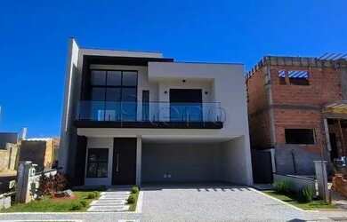 Imagem: A casa em condomínio possui 3 Dormitórios, 2 Banheiros, 4