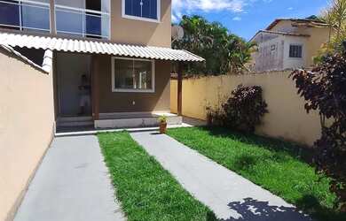 Imagem: A casa possui 2 Dormitórios, 3 Banheiros, 2 Vagas na garagem