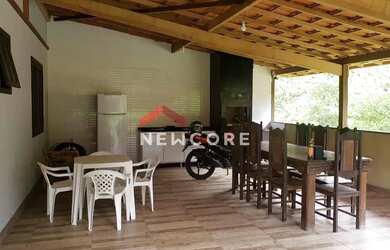 Imagem: A casa possui 3 Dormitórios, 3 Banheiros, 3 Vagas na garagem