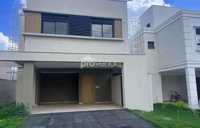 Imagem: A casa possui 4 Dormitórios, 4 Banheiros, 4 Vagas na garagem