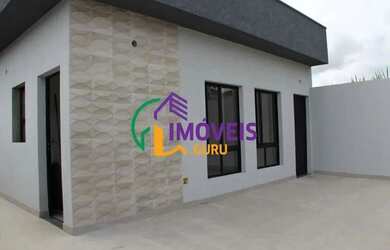 Imagem: A casa possui 3 Dormitórios, 2 Banheiros, 3 Vagas na garagem