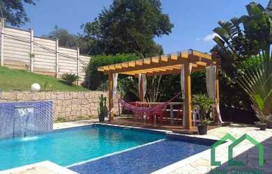 Imagem: A casa em condomínio possui 3 Dormitórios, 5 Banheiros, 4