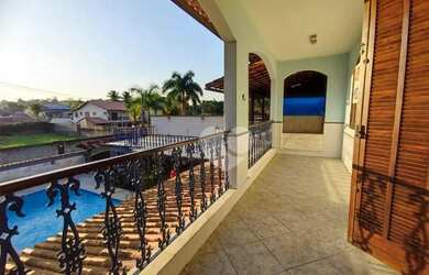 Imagem: A casa possui 5 Dormitórios, 5 Banheiros, 5 Vagas na garagem