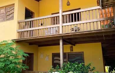 Imagem: A casa possui 5 Dormitórios, Acomodam 15 pessoas, 5 Vagas na