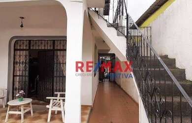 Imagem: A casa possui 5 Dormitórios, 4 Banheiros, 2 Vagas na garagem