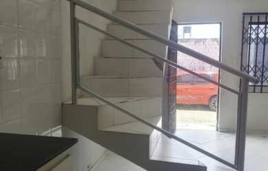 Imagem: A casa possui 3 Dormitórios, 2 Banheiros, 1 Vaga na garagem