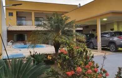 Imagem: A casa possui 3 Dormitórios, 5 Banheiros, 5 Vagas na garagem